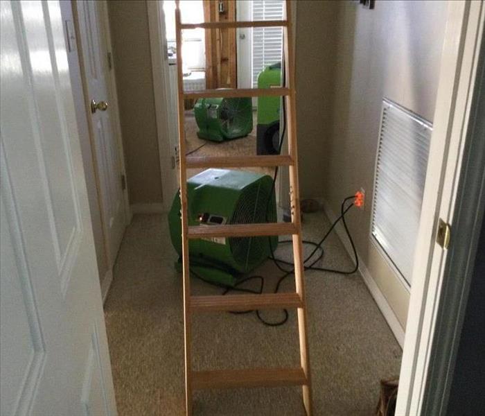 SERVPRO equipment in home with attic ladder pulled down
